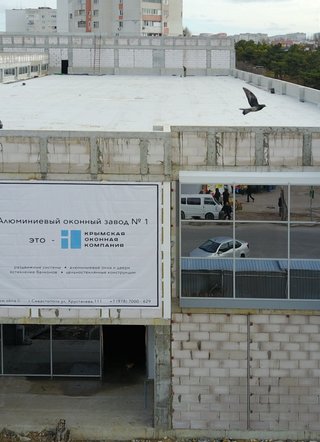 Обустройство фасада и алюминиевое остекление ТЦ в г. Севастополь, Хрюкинский рынок